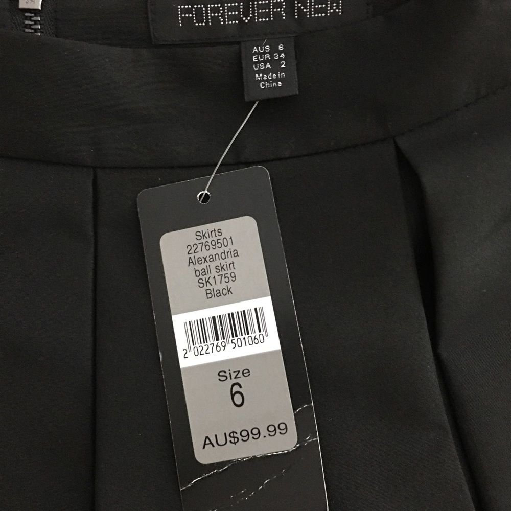 NWT Black skirt for sale. Perfect - dinner/party